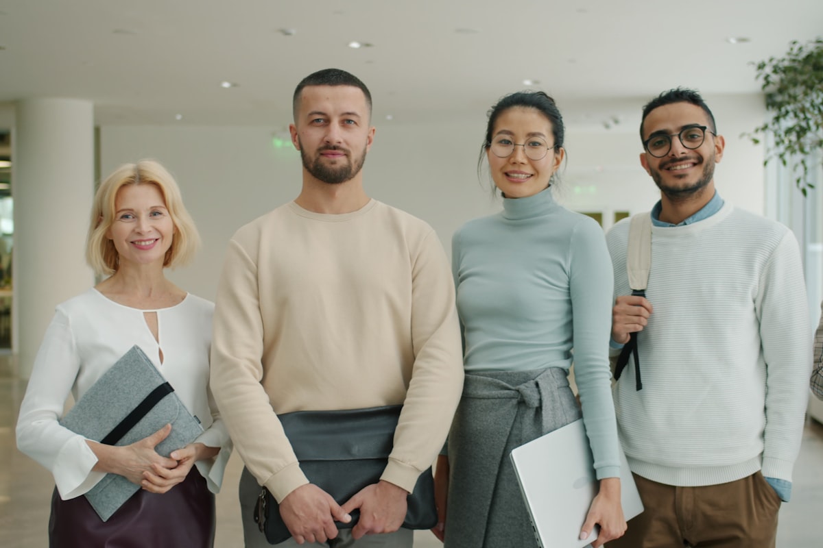 A diverse group of professionals standing together
